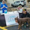Debbi Bauer and pet owner at the microchipping event
on Saturday