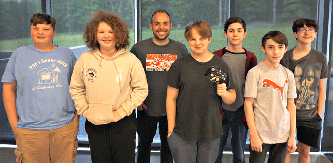 The RSMS Esports team will compete for a state title on May 27. Pictured left to right: Brody Colman, Otto Davenport, Coach Drew Parsons, Travis Gray, Mathew Crabtree, Ben Zwicky, and Gage Johnson.