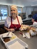 Shirley Thomas serves chicken at the Broiler Festival, she has attended all 72 festivals.